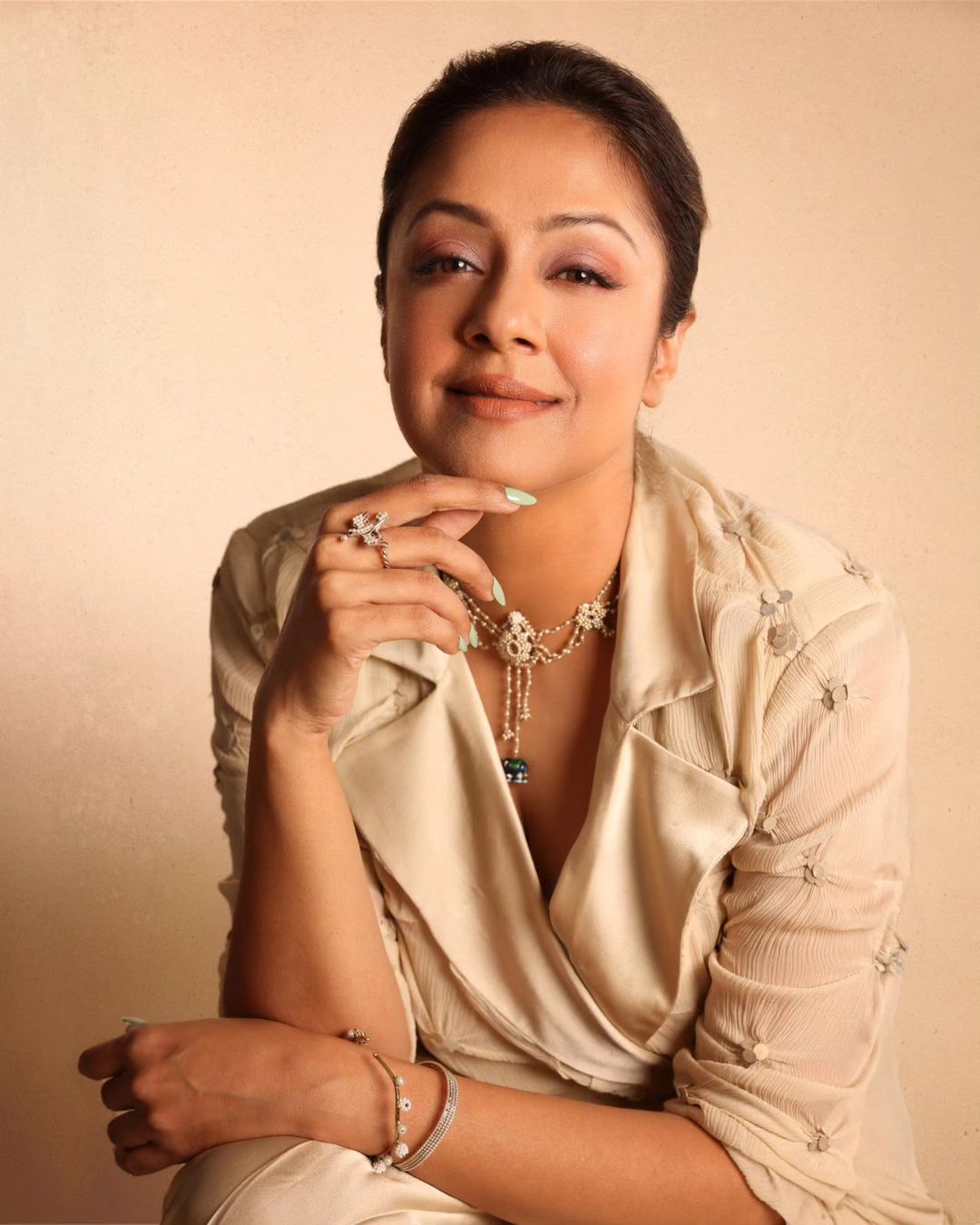 TAMIL ACTRESS JYOTHIKA STILLS IN GREY COLOR DRESS